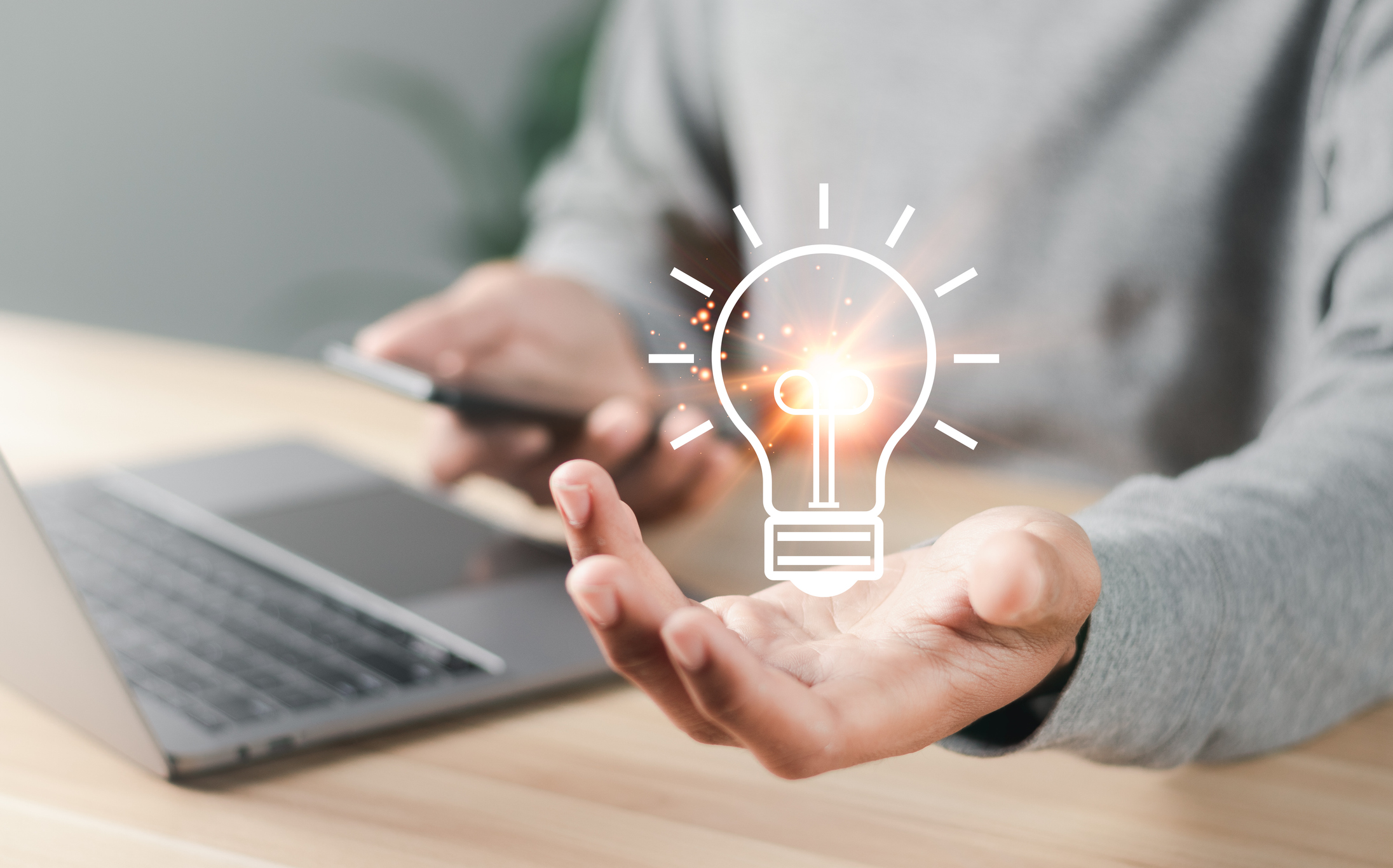 Businessman with light bulb icon shining. Concept of Ideas for presenting new ideas Great inspiration and innovation new beginning.